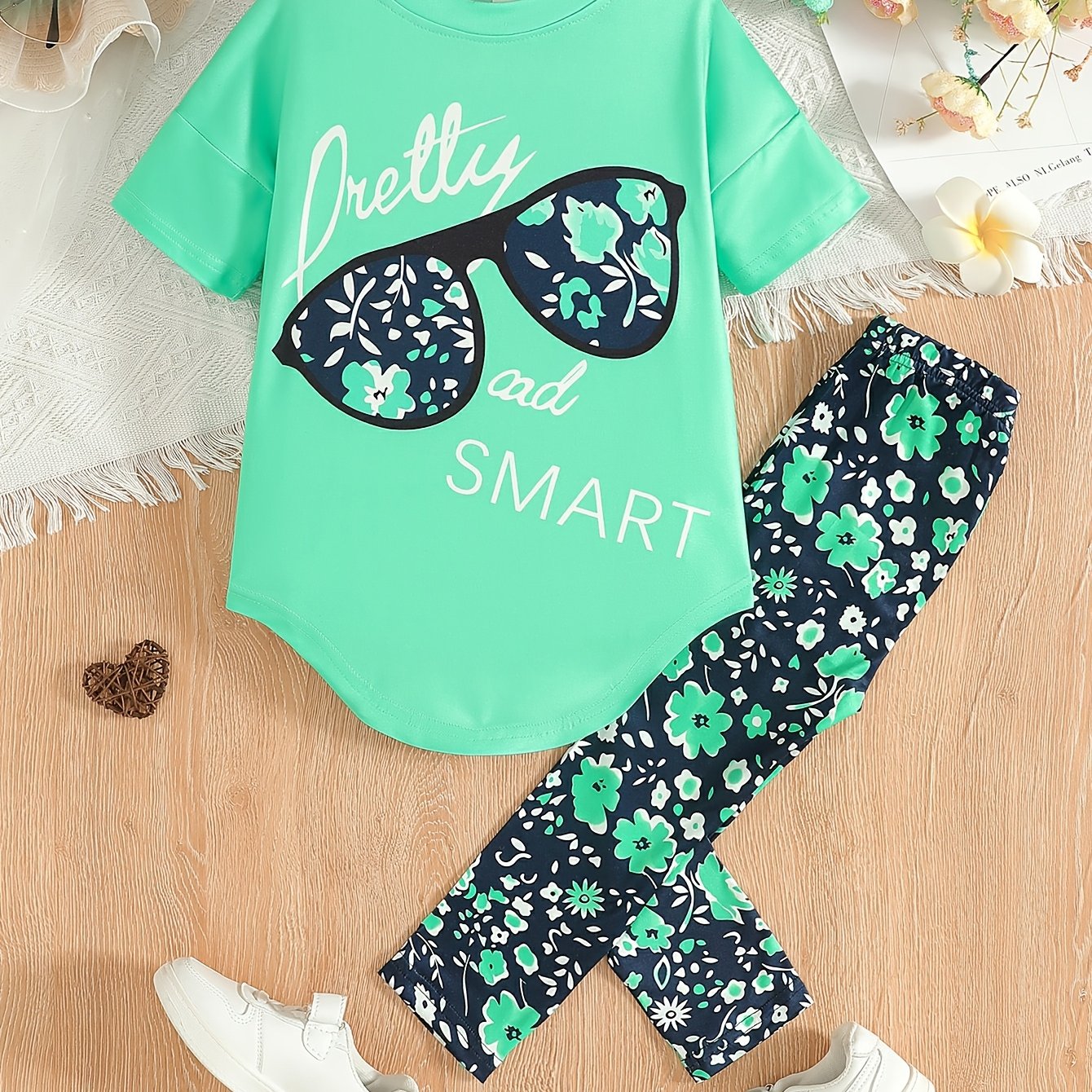 2pcs Girls' Clothing Party Slogan Large Glasses Print Pattern Drop Shoulder Irregular Hem Design Loose Short Sleeve T-Shirt + Floral Print Skinny Nine-Tenths Bottoms Set Girls' Summer Outfit Holiday Gift Girls' Fashion Casual - The Superior Findings Depot